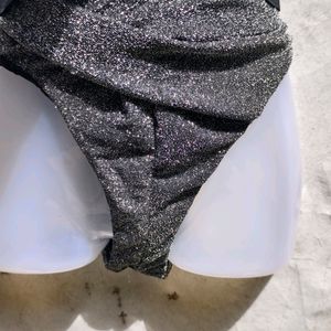 I. GLITTERY BLACK BRIEF