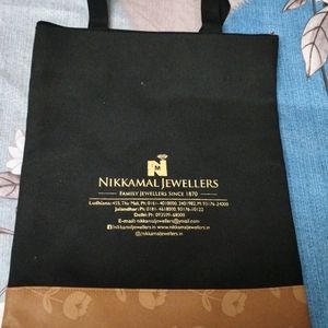 Nikkamal Jewllers Handbag .