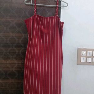 A Red Color Dress With White Stripes