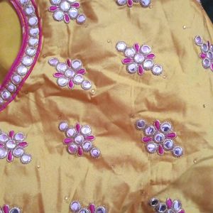 Mustard Yellow Choli With Pink Skirt