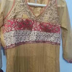 It's golden color anarkali. L size