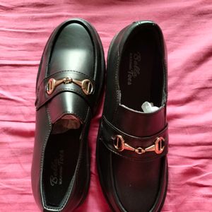 Black Heeled Horsebit Loafers