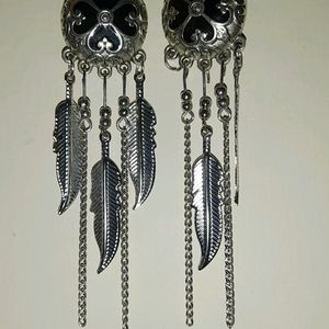 Silver Earrings In Black Effect