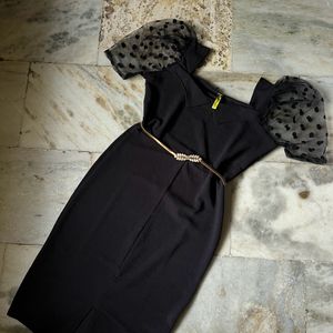 Black bodycon dress with puff sleeves