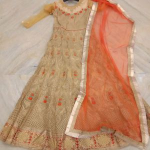 party wear golden and orange gown