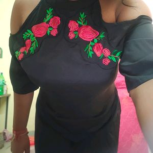 Black cold-shoulder dress with rose embroidery