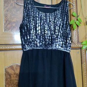 Black slip dress, ankle length. Regular fit party wear dress