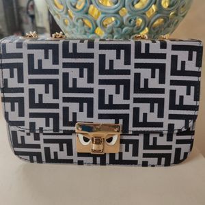 Qaeru FF Print Sling bag In Excellent Condition