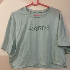 “Positive” crop tee