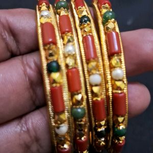 Beautiful coral and gold bangles Sz 2.8