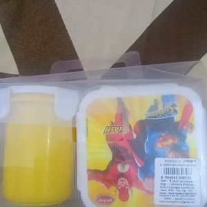 Yellow Lunch Box With A Tumbler