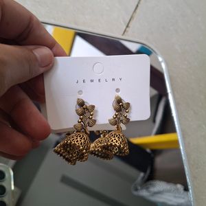 2 ETHNIC GOLD EARINGS