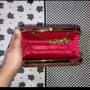 Maroon clutch