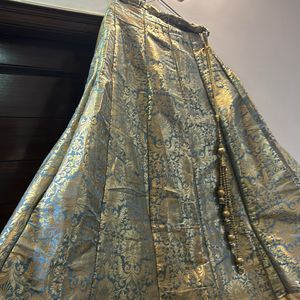 Brocade Lehnga With Golden Backless Choli