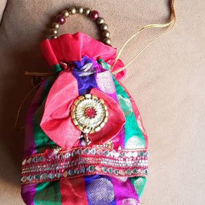 Small Bag To Carry With Saree.