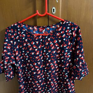 A Gently Used Crepe Top With Lovely Print