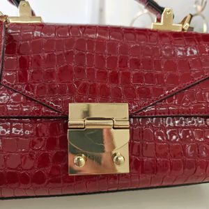 Aldo burgandy/Maroon Sling Bag