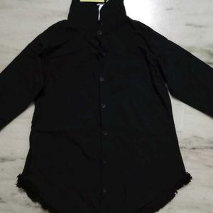 A Black Shirt With Good Or Excellent Quality.