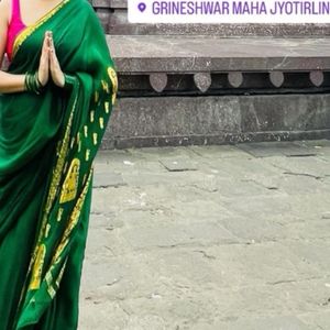 Green Saree With Pink Sleevless Blouse