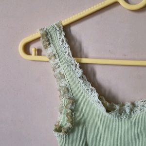 Lace Trimmed Ribbed Bodysuit