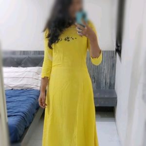 Designer Yellow Gown With Intricate Thread Work And Full Flare