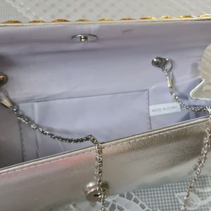 Silver Clutch with golden stones