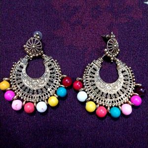 Round sep big or long ston earrings