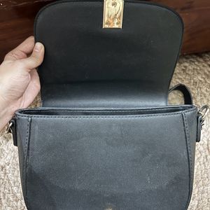 Heavily Used Black Sling Bag With Scratches+Tears