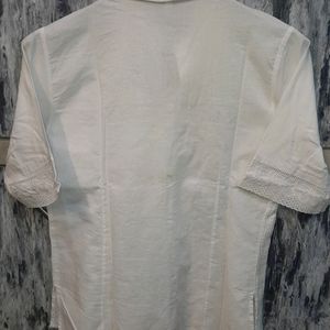 White Colored Shirt With Net Work On Front Sleeves