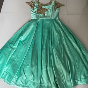 Beautiful Pista Colour Gown With Sleeves Pattern