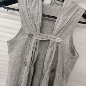 Grey Sleeveless Shrug With Button Holds