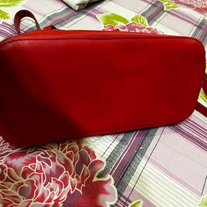 CAPRESE Red Sling Bag With Detachable Strap