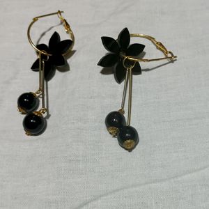 Earing Of Wood Black In Colour