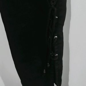 Flared Black Jeans With Cut Design