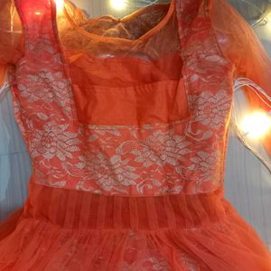 Orange color embroider gown for Women