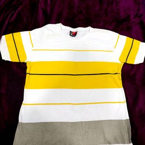 White Tshirt With Yellow And Black Stripe..