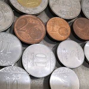 Saudi Riyal And German Euro Cents Coins