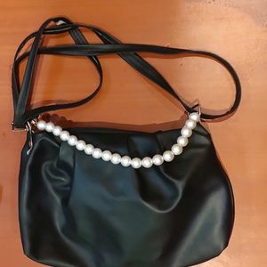 Black Sling Back With Pearl Strap Attachment