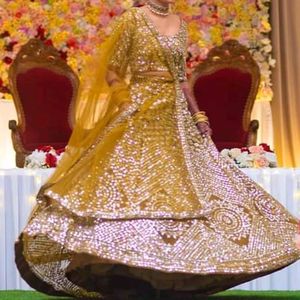 Golden Heavy Mirror Worked Lehenga