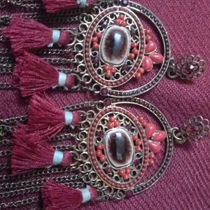 Maroon Fur And Stone Earnings