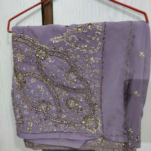 Beautiful detailed work saree purple for weddings and functions