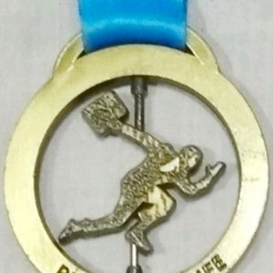 Collectible PUMA Urban Stampede Finisher Medal.