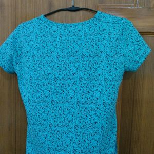 Blue Cotton T Shirt With Black Print.