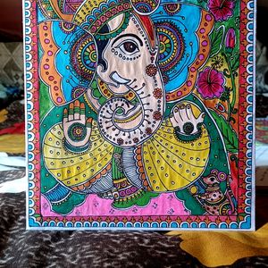 Homemade Lord Ganesha. Madhubhani Painting. Water,