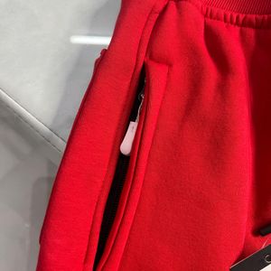 RED CONVERSE LOWER WITH SIDE POCKET