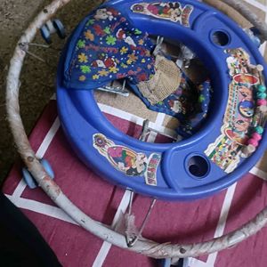 Baby Walker In Blue Colour Working Condition