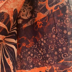 Abstract print Orange Saree