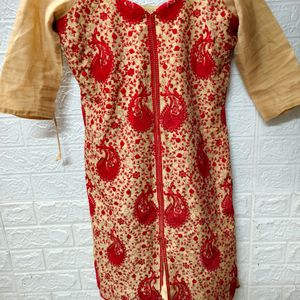 Golden Kurti With Red Embroidery