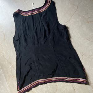 Embroidered sleeveless top