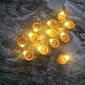 Pack of 12 Pcs Water LED Sensor Diya for Diwali